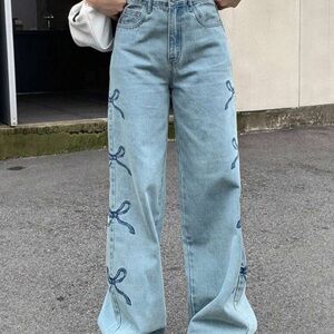 Women's Light Blue Jeans with Bow Details